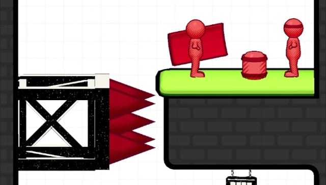 Red sketchbook enemies on a green platform beside red spikes, drawn in pen and ink