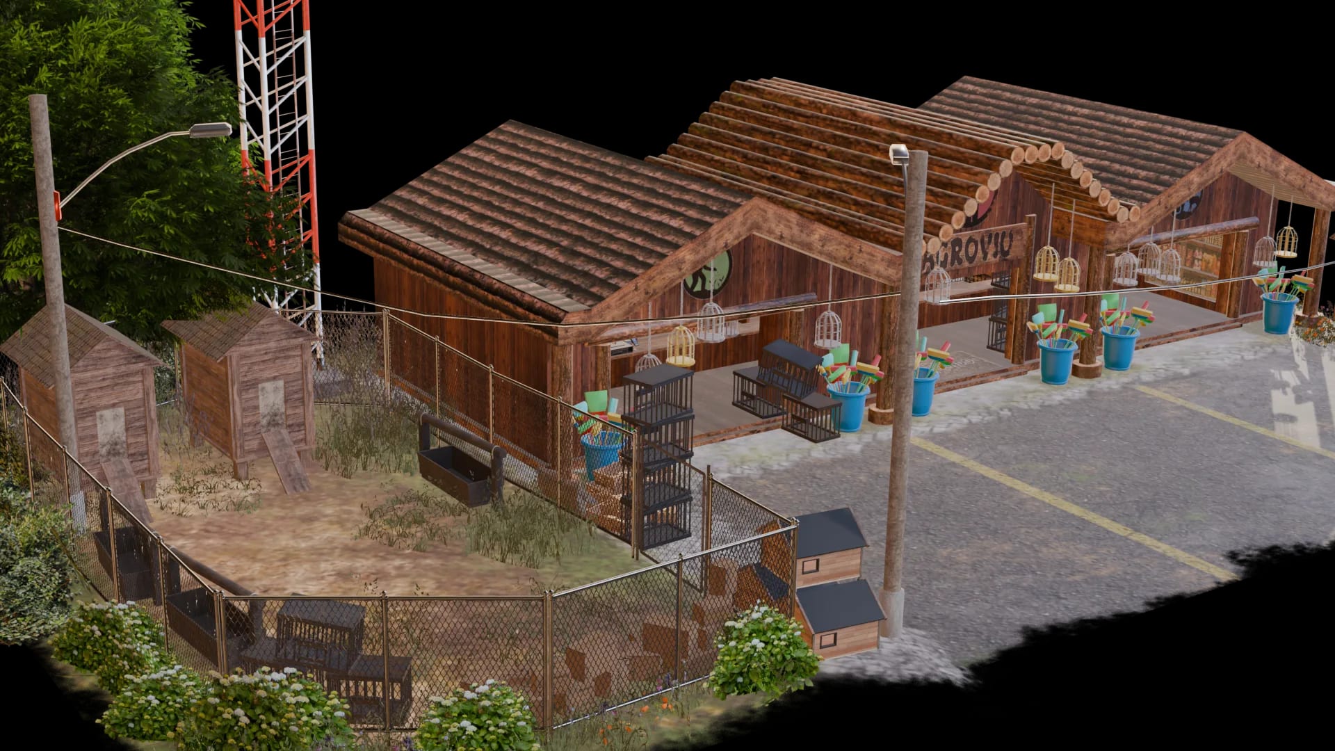The yard behind the store, fenced and full of props